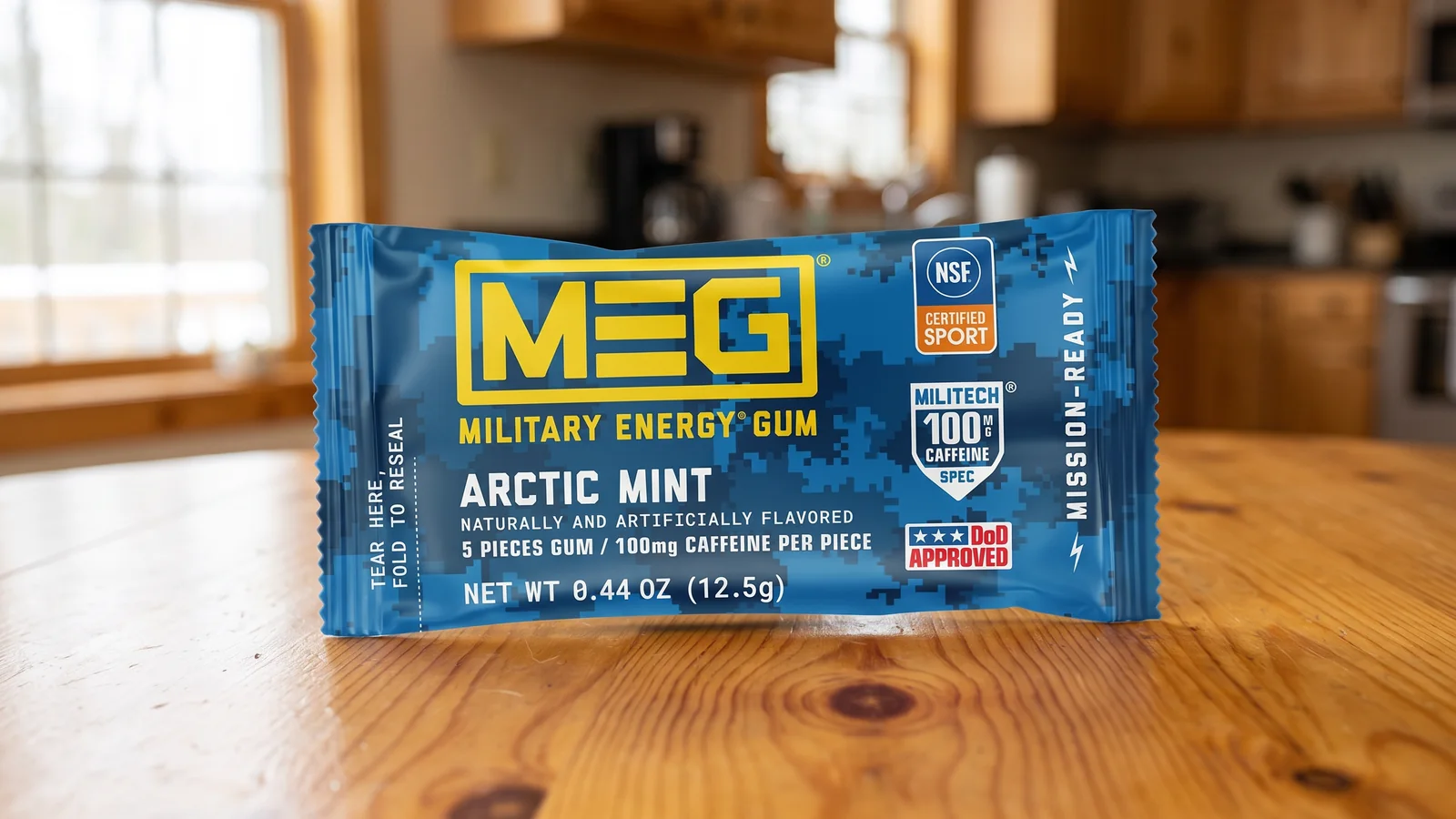 Military Energy Gum Arctic Mint packet on a wooden table
